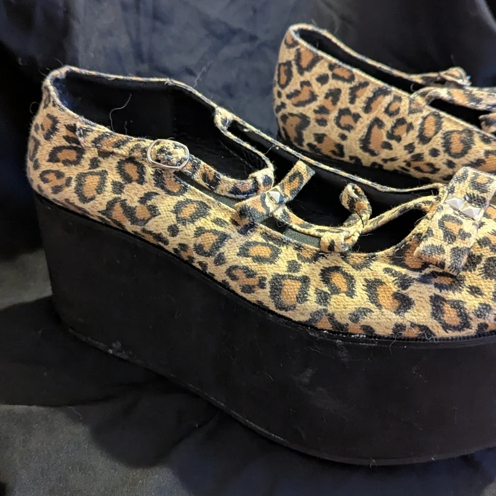 Demonia Studded Cheetah Print Platform Shoes